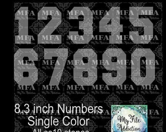 May include: A set of ten 8.3 inch rhinestone numbers, 1 through 0, in a single color. All stones are size ss10.