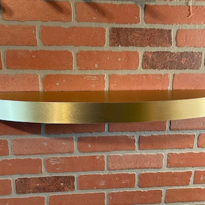 Floating shelf, mantel - curved, golden stainless, oval modern floating shelf ( laminated with o,8 mm solid stainless)