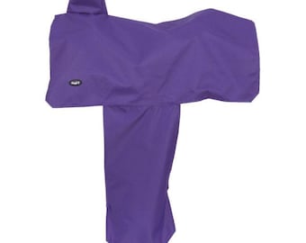 May include: A solid purple saddle cover designed to protect equestrian equipment. The cover features a smooth, opaque fabric construction with a contoured shape to fit over a saddle and a small black oval label with the white text Tough-1.