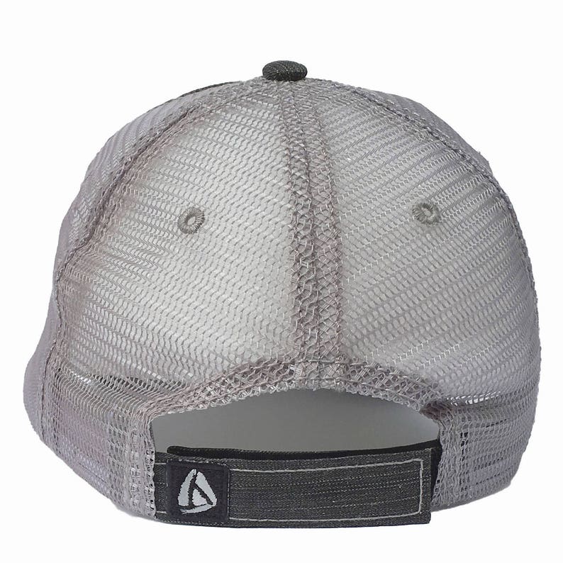 May include: Gray mesh trucker hat with a black adjustable strap and a small gray sailboat logo on the back.