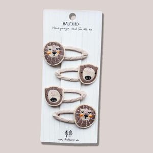 4 hair clips lion and bear