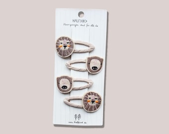 4 hair clips lion and bear