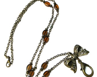 Beaded Chain Lanyard necklace, Work ID badge holder, Filigree Lace Bow Bronzed autumn tones,