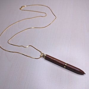 Joan holloway pen necklace best sale