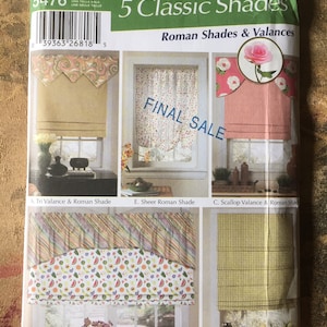 May include: Simplicity sewing pattern number 5476 for making five classic Roman shades and valances. The pattern includes a tri valance, a standard valance, a scallop valance, a sheer Roman shade, and a Roman shade. The pattern is on a white background with a photo of each shade and valance.