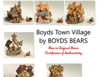 May include: A collection of six miniature houses, each with unique details and a charming, rustic style. The houses are made of a variety of materials, including wood, stone, and brick. The houses are all in excellent condition and come in their original boxes. The houses are part of the Boyds Town Village collection by Boyds Bears.  New in Original Boxes. Certificates of Authenticity.