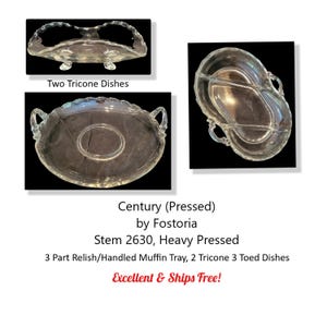May include: A three-part glass relish or handled muffin tray with two small footed dishes. The tray is clear glass with a scalloped edge and handles. The dishes are also clear glass with a scalloped edge and three feet. The text "Century (Pressed) by Fostoria Stem 2630, Heavy Pressed 3 Part Relish/Handled Muffin Tray, 2 Tricone 3 Toed Dishes Excellent & Ships Free!" is printed below the image.
