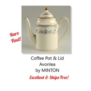 May include: A white coffee pot with gold trim and a floral pattern. The lid is also white with gold trim and a floral pattern. The pot is labelled "Coffee Pot & Lid Avonlea by MINTON".