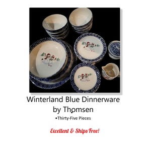 May include: A set of Winterland Blue dinnerware by Thomsen, featuring a snowman design. The set includes 35 pieces, including bowls, plates, and a creamer.