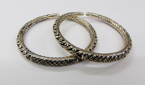 Silver leg best sale bangles