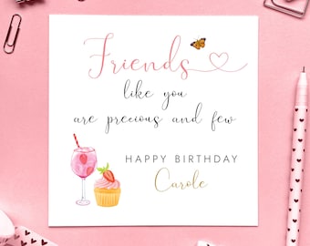 May include: A white card with pink and gold lettering that reads "Friends like you are precious and few. Happy Birthday Carole". The card features a pink cocktail with a strawberry and a cupcake with a strawberry on top.