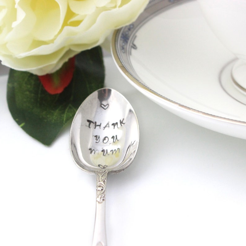 A hand stamped personalised tea spoon