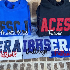 Felpa personalizzata con mascotte della scuola glitterata - taglie unisex