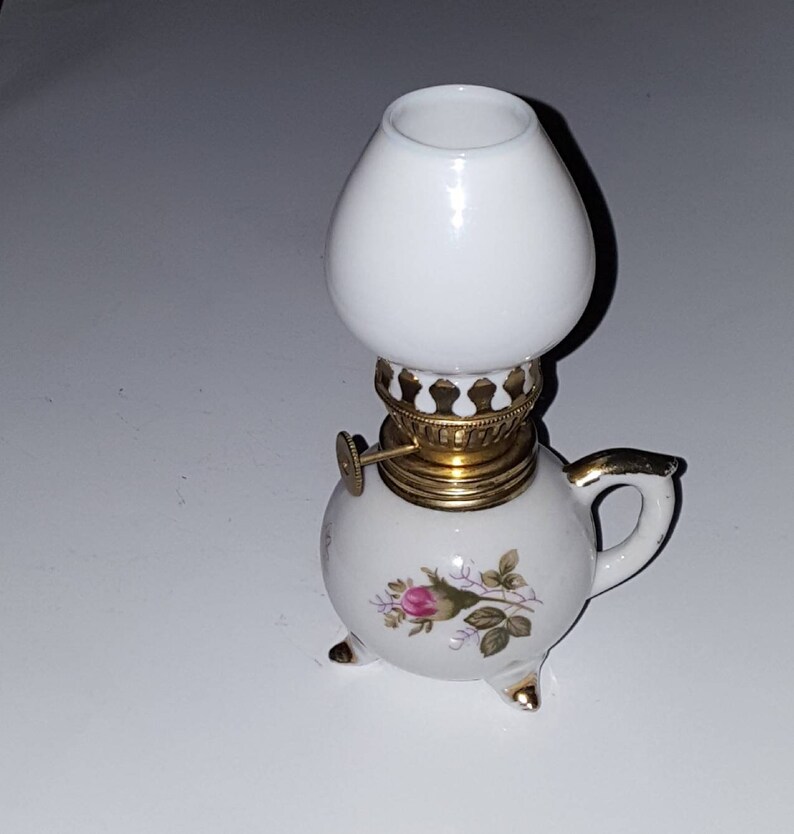 Vintage White Porcelain Miniature Oil Lamp Finger Handle With Milk Glass Ball Shade Antique Footed Hand Painted Moss Rose Pattern