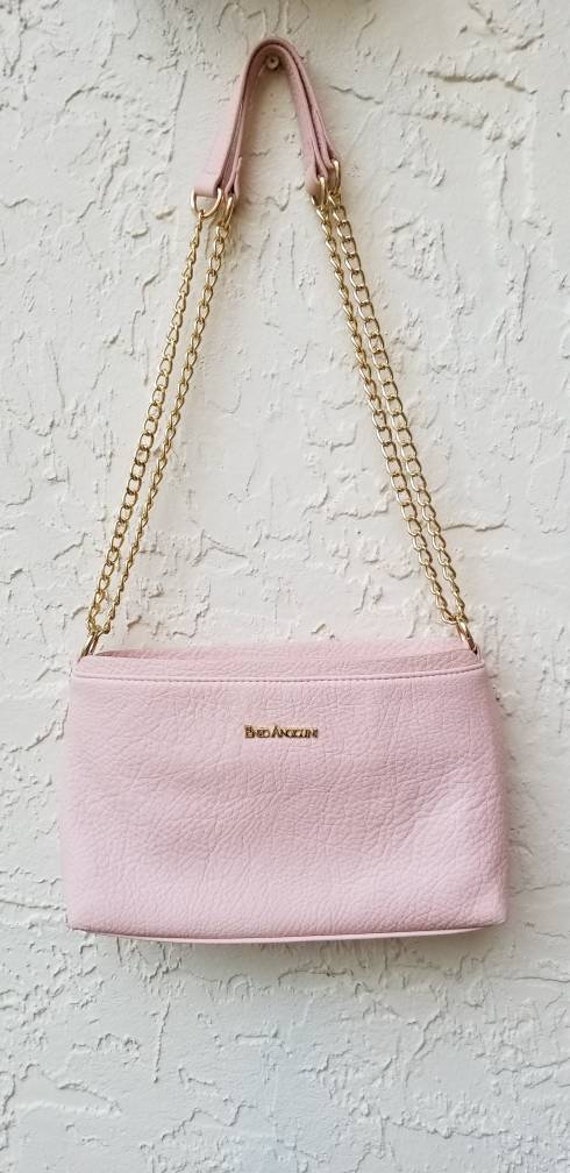 pink purse with chain strap