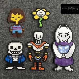 May include: A set of six pixel art characters from the video game Undertale. The characters are made of colourful beads and include Sans, Papyrus, Frisk, Toriel, Flowey, and Asriel.