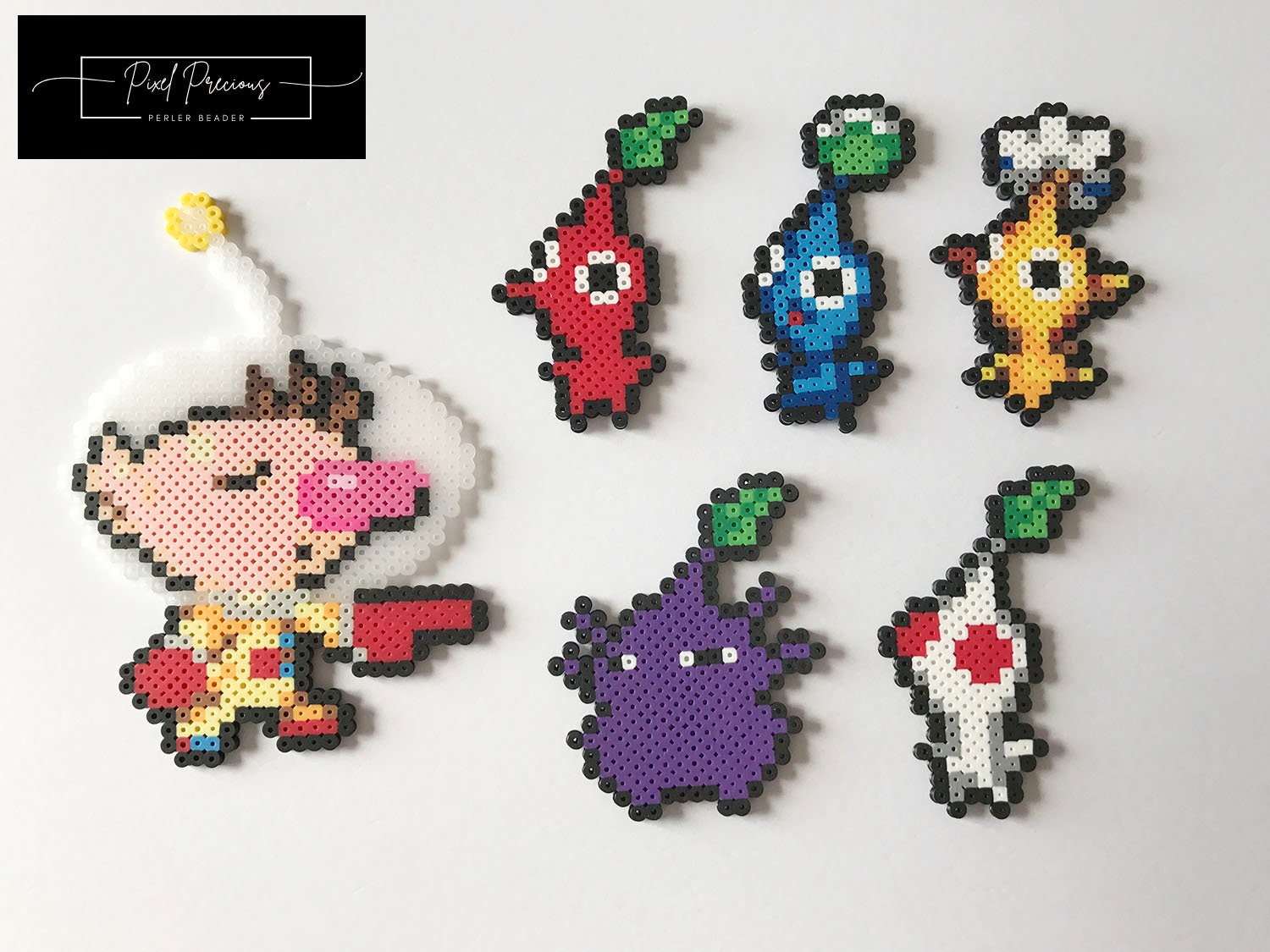 Captain Olimar and Red, Blue, White, Yellow, White, Purple Pikman