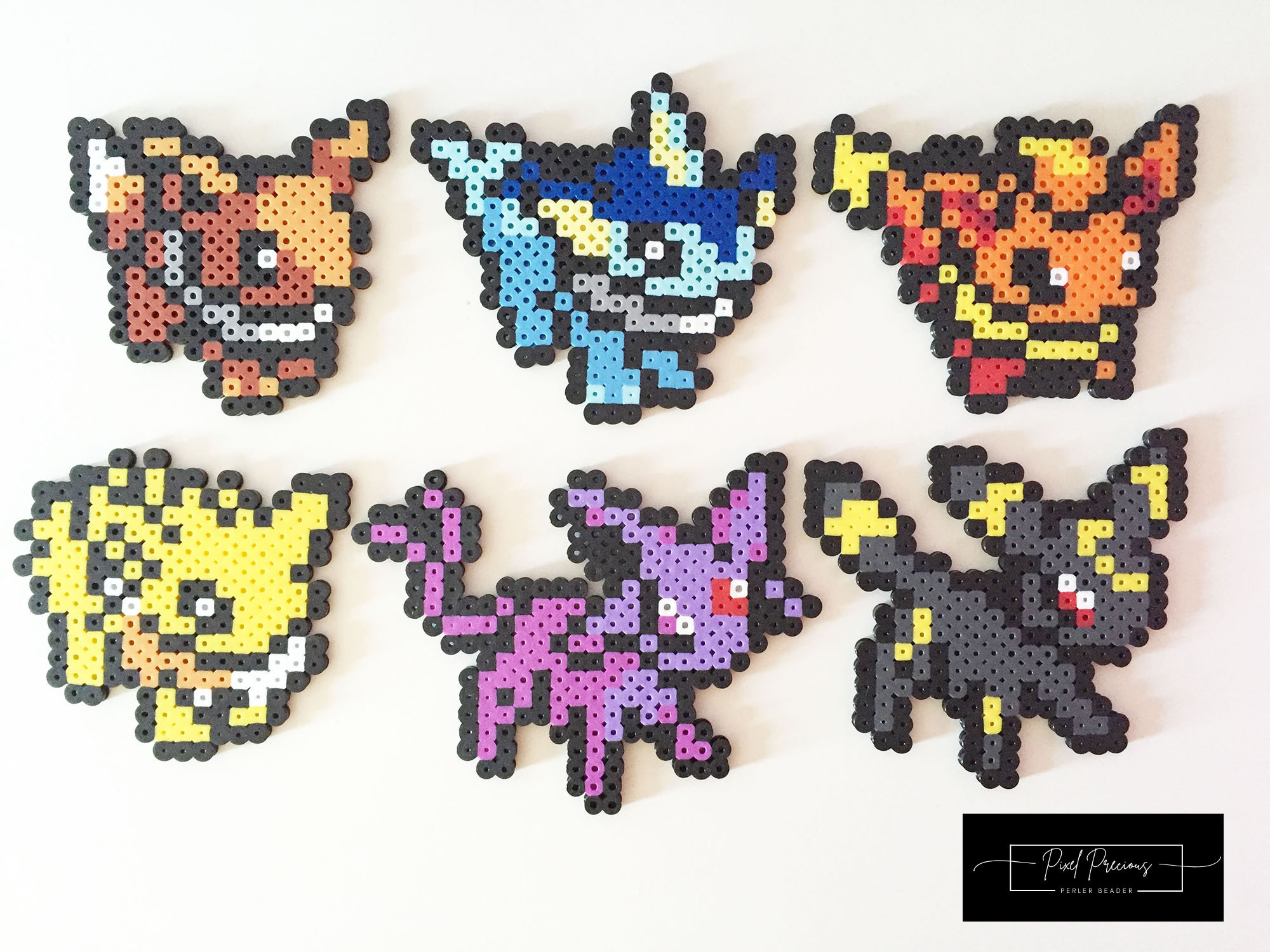 Chaveiro Pokemon Evolução Eevee, Vaporeon Glaceon Leafeon Espeon Jolteon  Flareon Umbreon (Hama Beads/ Pixel Art/ Perler Beads/ Pixel Arte) -  Escorrega o Preço