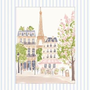 May include: A watercolor painting of a Parisian street scene with the Eiffel Tower in the background. The painting features a cafe with pink and white striped awning, a street lamp, and a tree with pink blossoms.