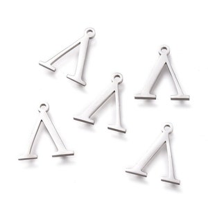 May include: Six silver metal charms shaped like the letter 'A' with a loop at the top for attaching to jewelry or other crafts.