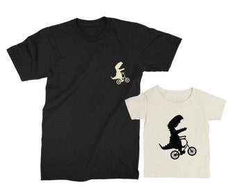 Father and Son matching shirts. Father's Day gift for Father and Baby. Matching Dinosaurs riding a bike shirt Set. Father Son matching tees.