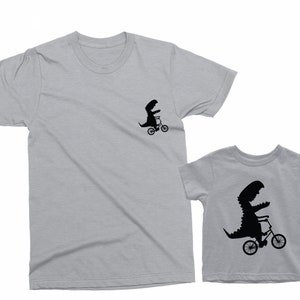 Father and Son matching shirts. Father's Day gift for Father and Baby. Matching Dinosaurs riding a bike shirt Set. Father Son matching tees. image 6