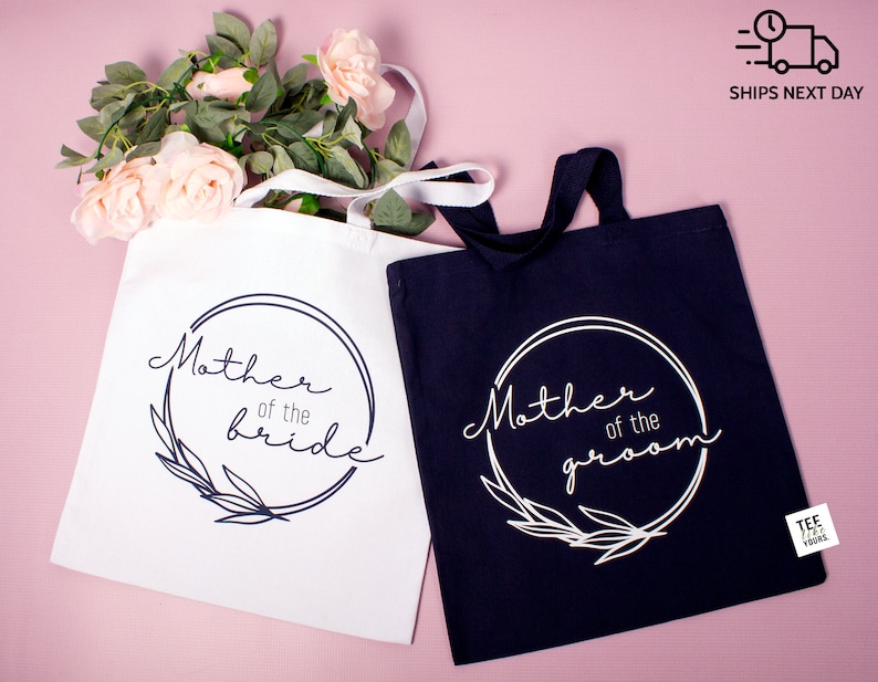 Wedding gift tote bag for parents: personalized heavy canvas tote with ‘Mother of the Bride’ and ‘Mother of the Groom’ printed designs, perfect thank you gift for wedding day and bridal party keepsake.
