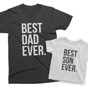 May include: Two black and white t-shirts with the text "Best Dad Ever." and "Best Son Ever." printed on them.