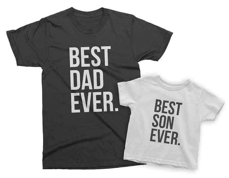 May include: Two black and white t-shirts with the text "Best Dad Ever." and "Best Son Ever." printed on them.