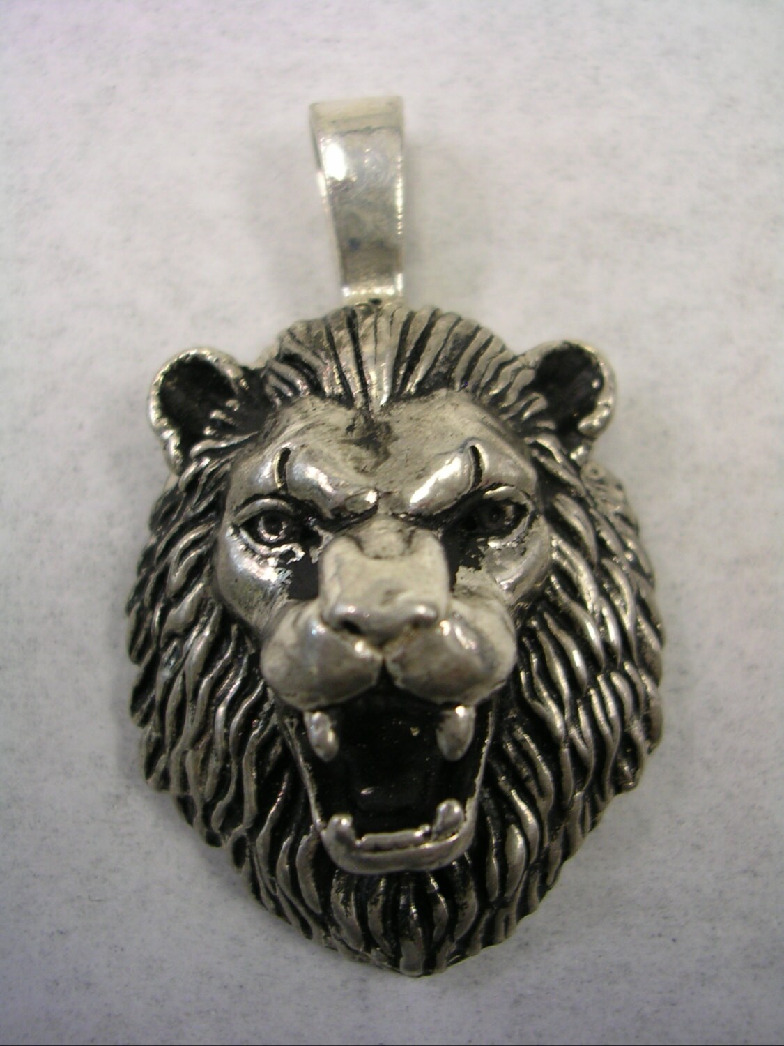 Lion Pendant Charm in Sterling Silver With an All High Polished Black