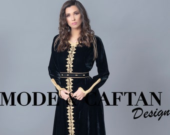 Moroccan kaftan in black velour embroidered with gold and matching belt.