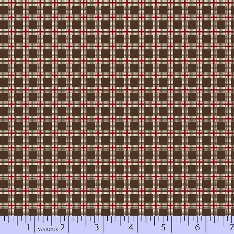 May include: Brown and beige plaid fabric with a red stripe. The fabric is measured with a ruler in inches.