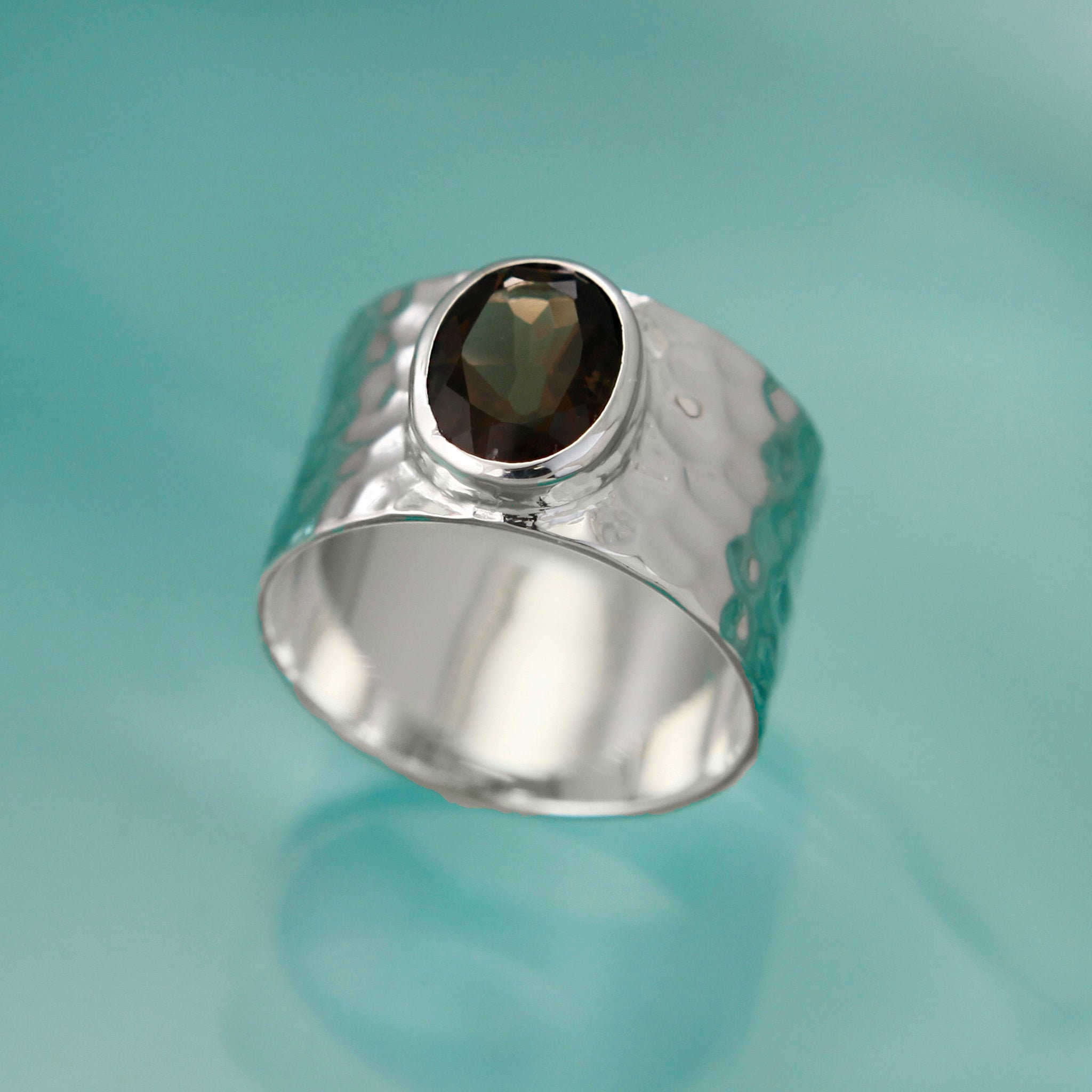 Hammered silver hotsell ring with stone