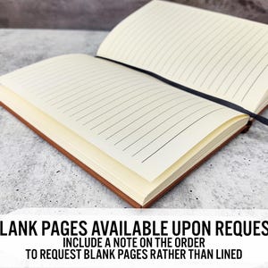 May include: A brown leather-bound journal with lined pages. The journal is open and the pages are visible. The text "BLANK PAGES AVAILABLE UPON REQUEST INCLUDE A NOTE ON THE ORDER TO REQUEST BLANK PAGES RATHER THAN LINED" is printed on the bottom of the image.