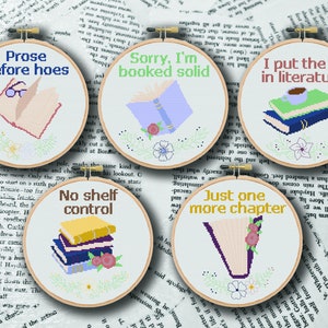 May include: Five embroidery hoop designs with book-themed sayings. The sayings are "Prose before hoes", "Sorry, I'm booked solid", "I put the lit in literature", "No shelf control", and "Just one more chapter".