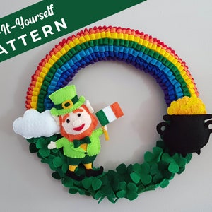 May include: Sew-It-Yourself Pattern for a felt rainbow wreath with a leprechaun, pot of gold, and shamrocks.