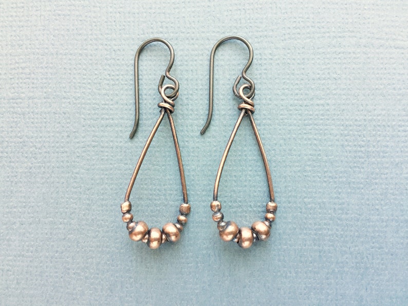 simple boho earrings antiqued copper teardrops Copper earrings with hypoallergenic niobium ear wires