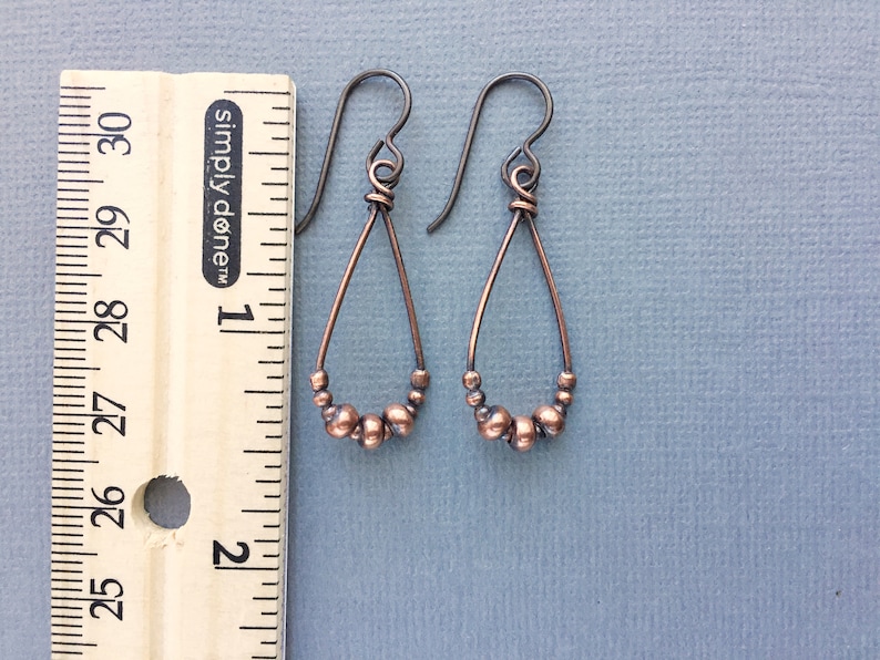 simple boho earrings antiqued copper teardrops Copper earrings with hypoallergenic niobium ear wires
