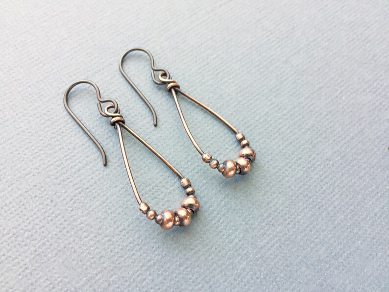 simple boho earrings antiqued copper teardrops Copper earrings with hypoallergenic niobium ear wires