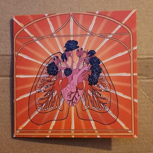 Carte coeur et poumons et roses noires