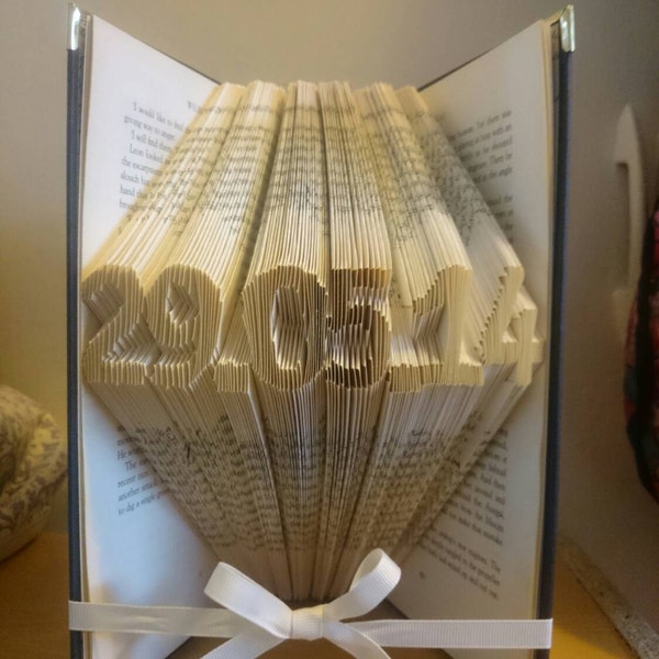 Folded book art. Pattern to make your own book