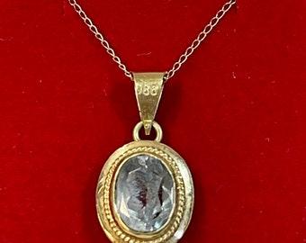14 Kt Gold with Genuine Blue Topaz Oval on 18 inch 10Kt Gold Chain