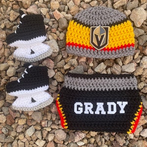 Crochet knight baby outfit with ice skates