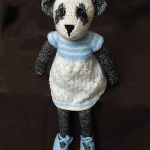 Bella the panda in hand knitted wool. Wool doll. Knitted doll. Wool doll handmade.