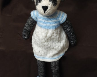 Bella the panda in hand knitted wool. Wool doll. Knitted doll. Wool doll handmade.