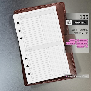 May include: A white daily planner insert with a grid and lined sections, labeled "Today," rests on a brown leather planner. The insert is pre-punched for a binder and includes the text "Daily Tasks & Notes 2-PP." The planner is undated.