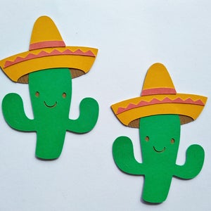 May include: Two green cactus cutouts with smiling faces wearing yellow sombreros with red trim.