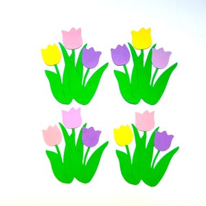 May include: Four sets of paper cutouts of tulips in pink, purple, yellow, and green. Each set has three tulips.