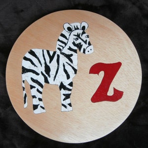 Drop out puzzle.Jigsaw puzzle, Children puzzle,wood. Wooden ,abc puzzle, round z or zebra puzzle