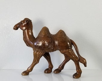 Vintage Hand Carved Wood Camel Sculpture .